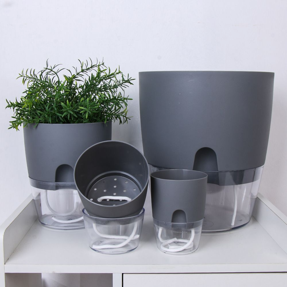 SELF WATERING POTS